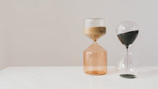 stylish various sand hourglasses placed on table
