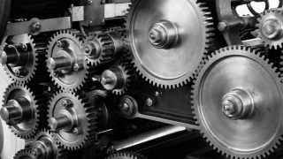 gray scale photo of gears